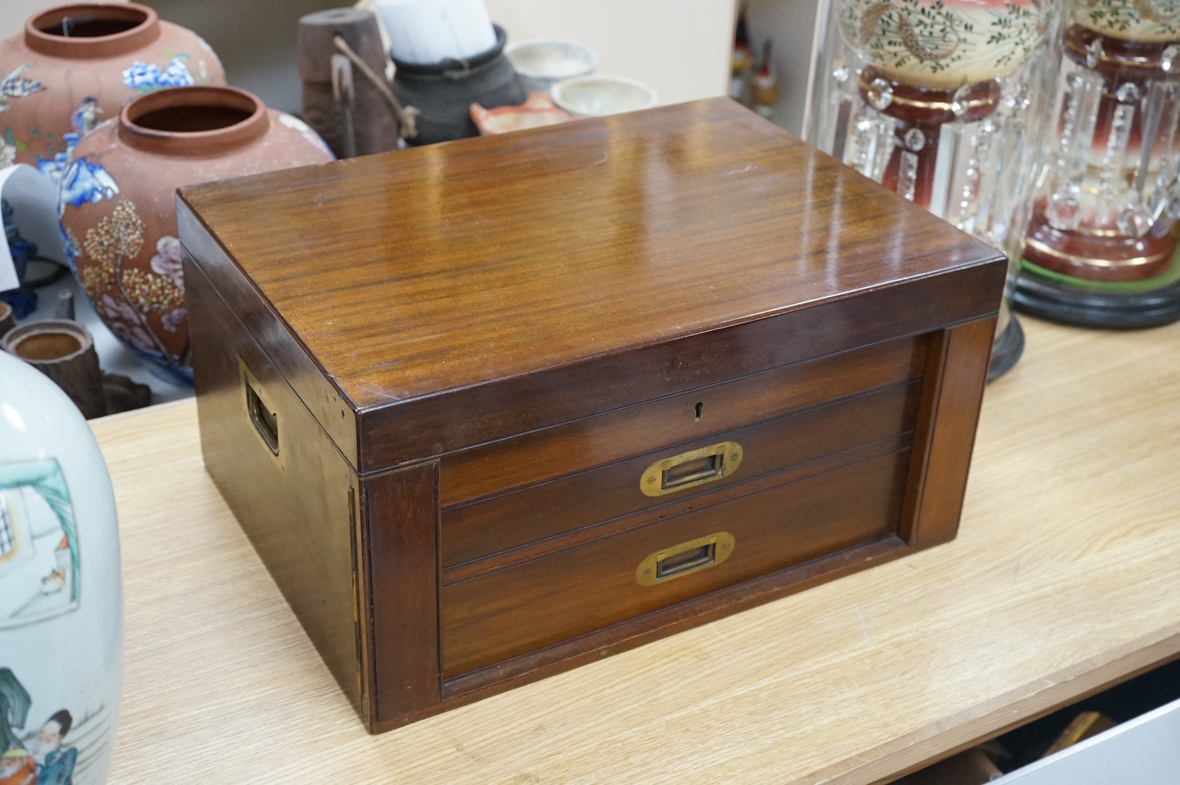 A Walker & Hall three-drawer canteen of plated cutlery. Canteen 48cm wide x 35cm deep x 24cm high. Condition - good